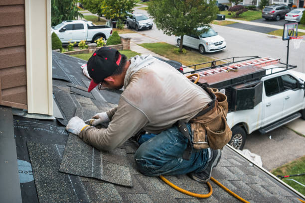 Professional Roof Replacement technician working in Dorena, OR